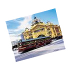 old photo of flinders station with a tram in front