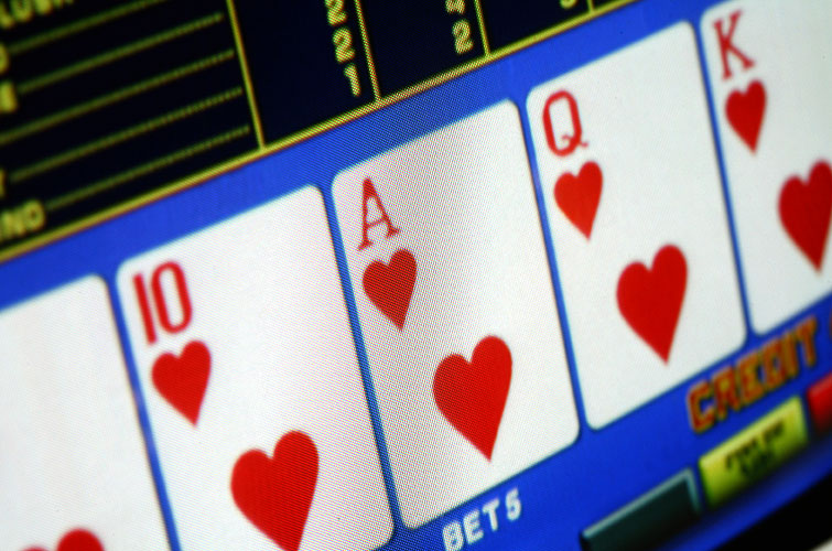 pokies hearts cards on a poker machine
