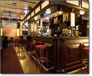 a bar in brisbane with a warm wooden decor