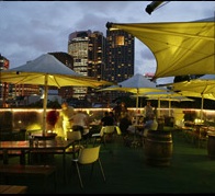 The Glenmore Hotel rooftop bar at night