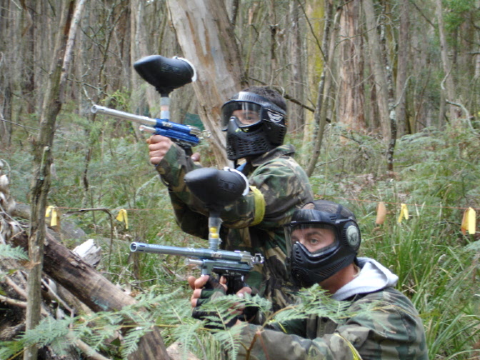 two men playing paintball