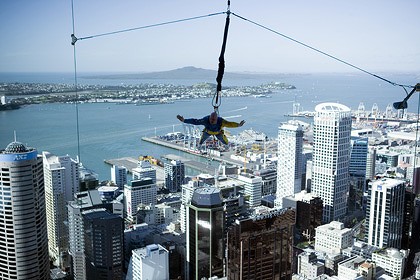 a man sky jumping from sky tower in Auckland