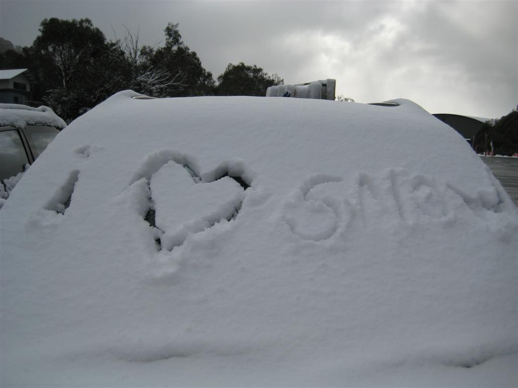 a heart drawn in the snow