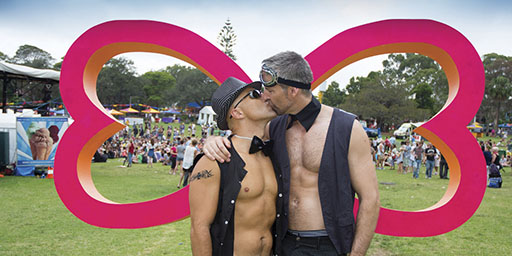 Mardi Gras men kissing Men kissing at Sydney Mardi Gras 2014