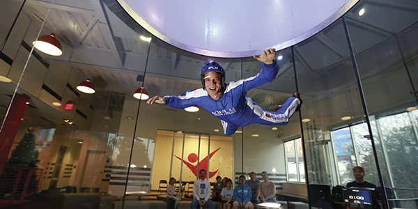 Skydiving iFLY Guy Man skydives indoor wind tunnel