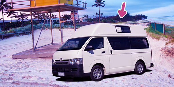 Getabout oz Campervan White Campervan on beach