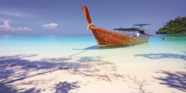 Boat on beach in Koh Rok, Thailand Boat on beach in Koh Rok, Thailand