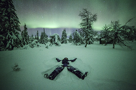 Northern lights snow angel