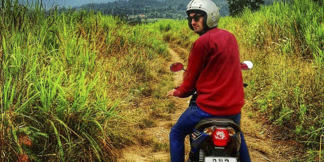 Michael Fenn in thailand moped in thailand