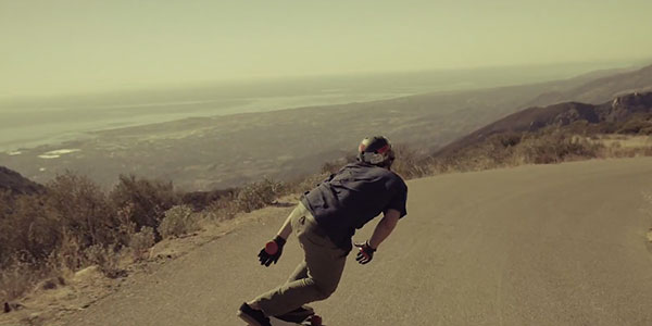 longboarding down a mountain
