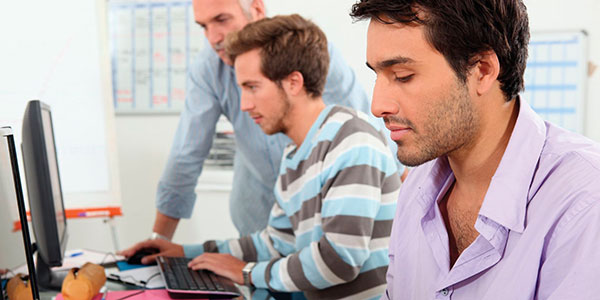 Australia needs IT Professionals - Men on Computer