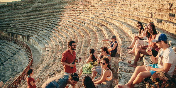 Geckos-Turkey-group-on-steps-sunse group of travellers on the steps in Turkey