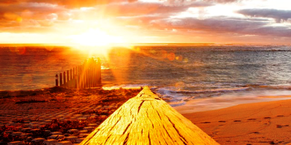 The sun sets behind the Margaret River horizon