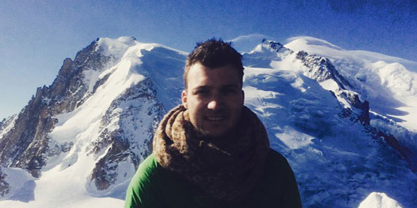 max-leyerer-mont-blanc man standing in front of snowy mountains