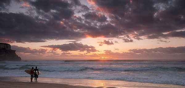 Manly-beach a couple on manly beach at sunset