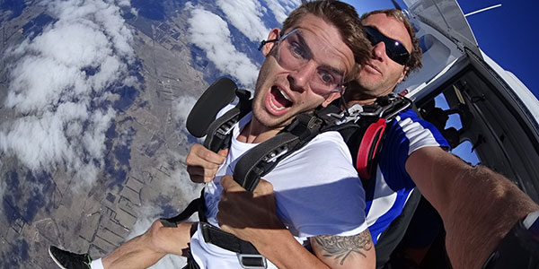 funny-facial-expressions-tandem-skydiving boy tandem skydiving in western australia