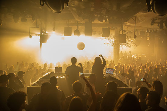 people dancing in a club