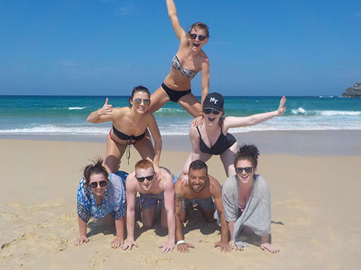 group pyramid on the beach in sydney
