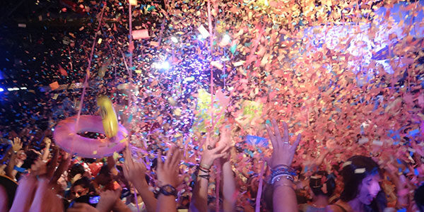 stoke-ibiza-party confetti falling on people at ibiza party