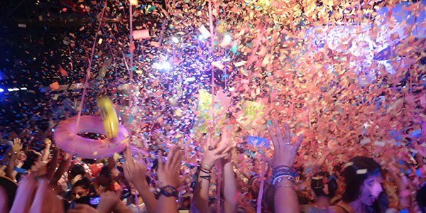 confetti falling on people at ibiza party