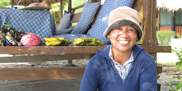 local woman cooking in indonesia