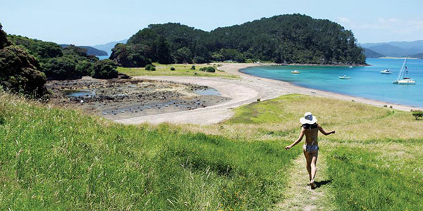 girl running down a track in new zealand