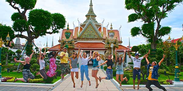 thaintro-temple-jump group jumping in front of temple