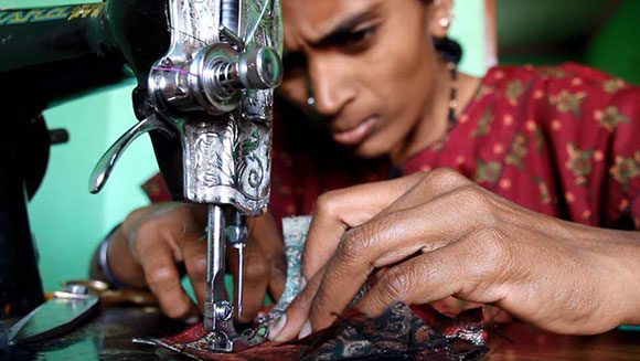 indian woman sewing