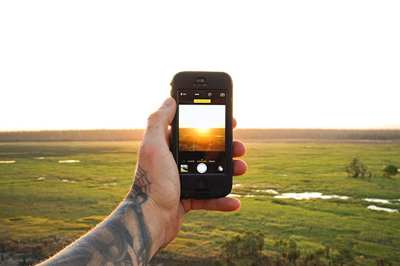 man taking a photo of a photo in the northern territory
