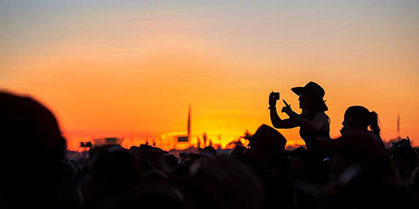 festival crowd with sunset