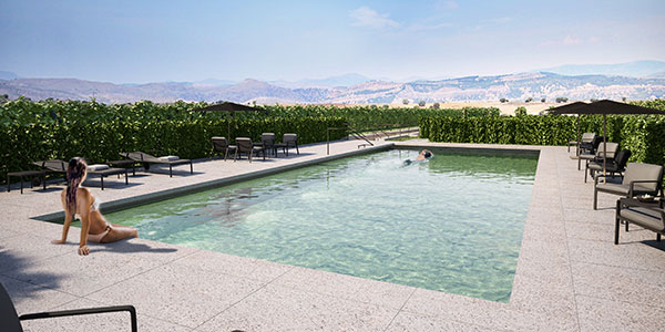 woman sitting by pool in spain
