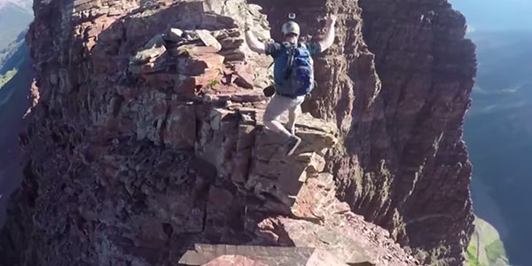 rock climbers leap of faith colorado