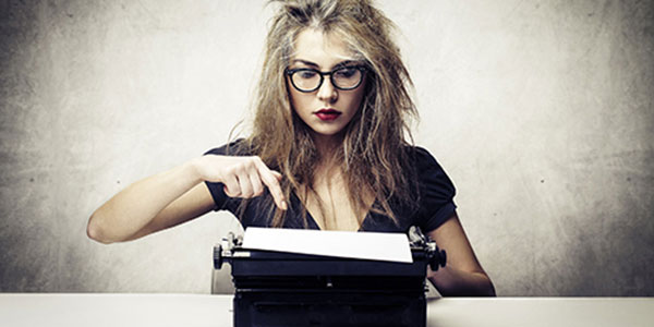 woman working on a typewriter