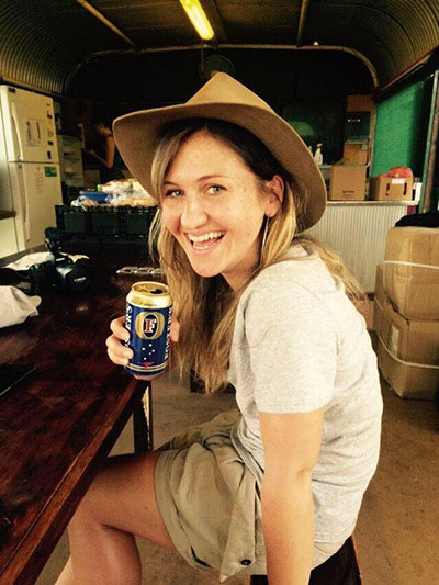 girl drinking fosters in australia