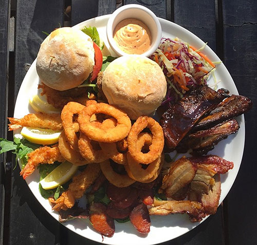benjamin-hodgetts-perth-food-scene big plate of American food in perth