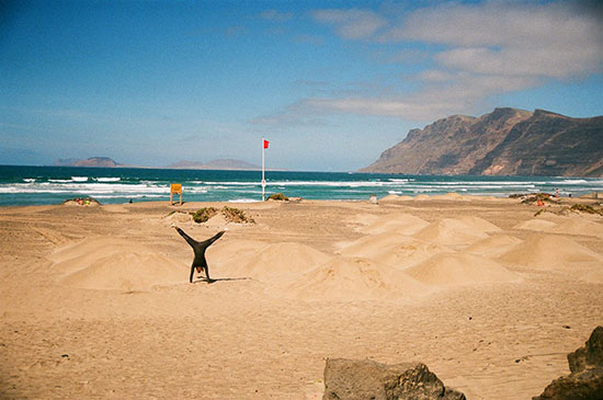 handstand on lanzarote beach