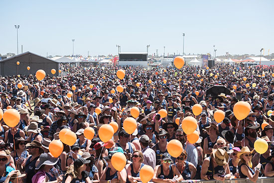 festival crowd with balloons