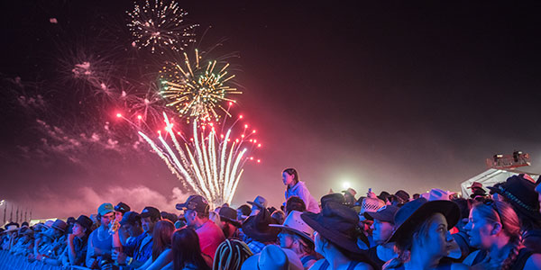 deni-ute-muster-fireworks festival crowd beneath fireworks