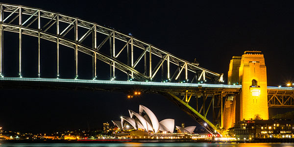 sydney opera house and harbour bridge at night