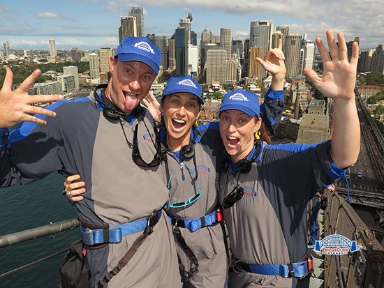 friends posing on sydney harbour bridge