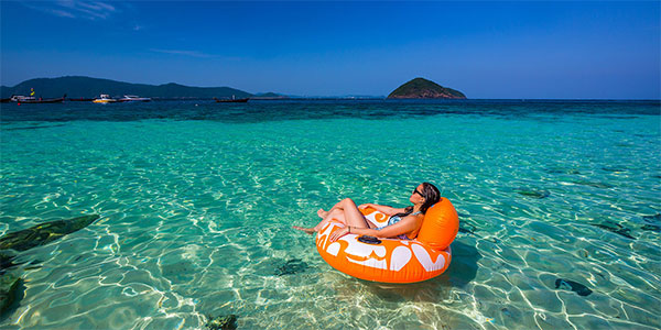 girl lying on inflatable ring