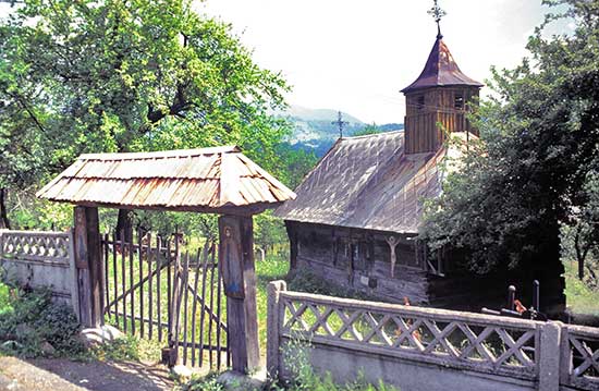 surdesti-wooden-church-romania Explore Romania Castle Forest Europe