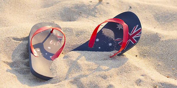 australia-flip-flops-in-the-sand sending money to or from australia