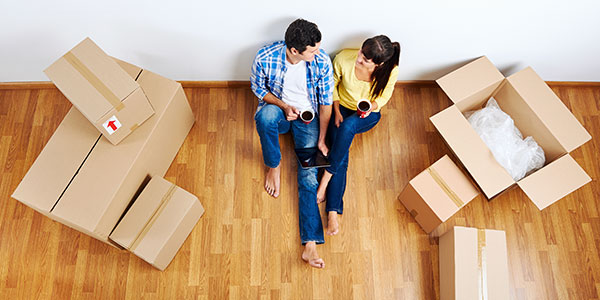 Couple-packing-boxes-shipping off to actually ship your items to Australia from the UK.