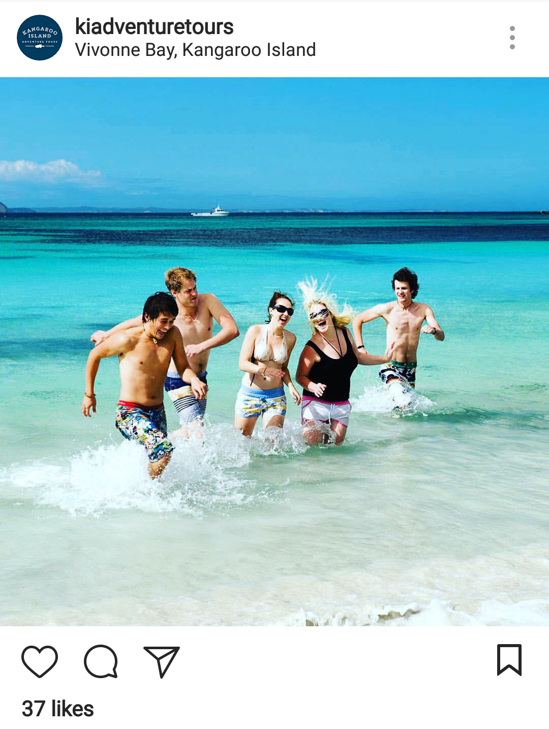 group of travellers running in the water