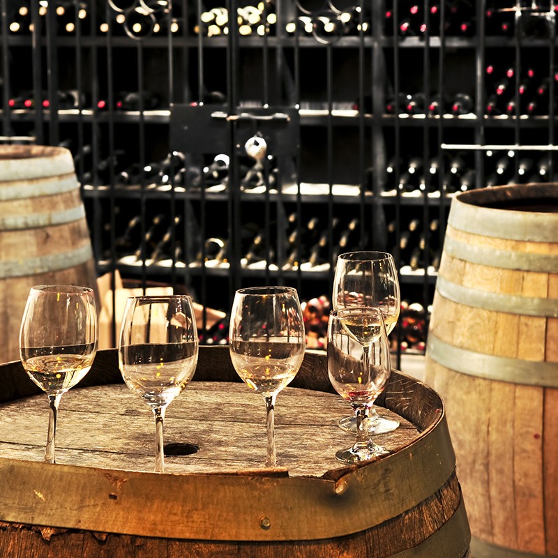 Wine glasses and barrels