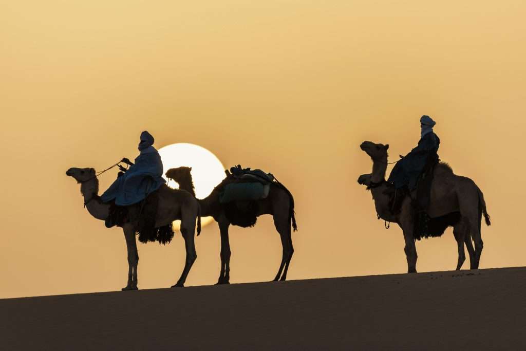 Camel ride through the Sahara Desert touristy spots in Morocco