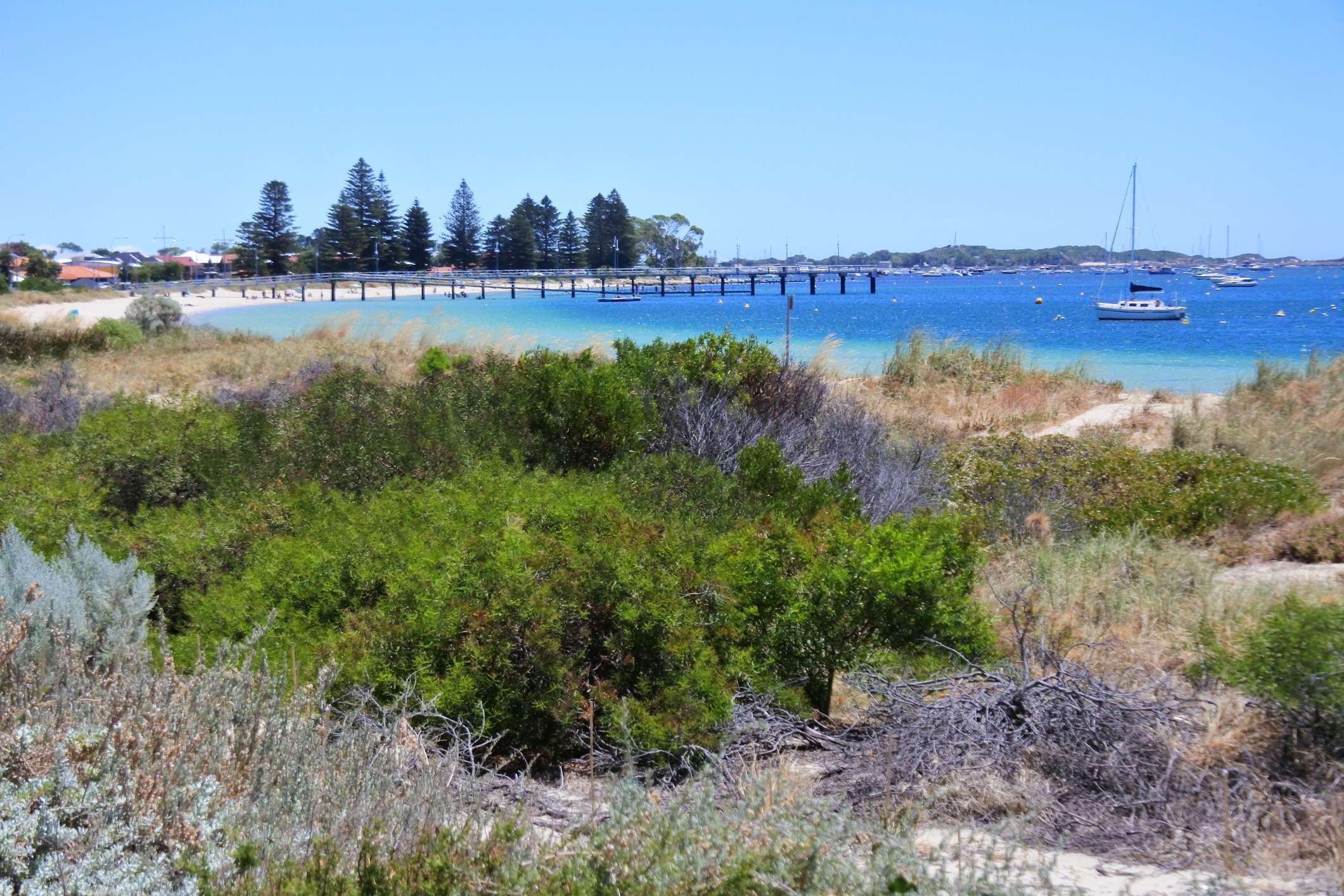 Rockingham Jetty and sail boats mooring on Rockingham beach in Western Australia Day Trip to Rockingham from Mandurah