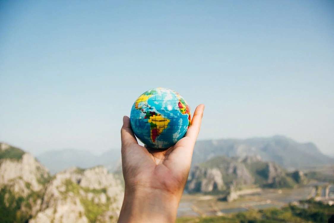 earth globe with mountain view