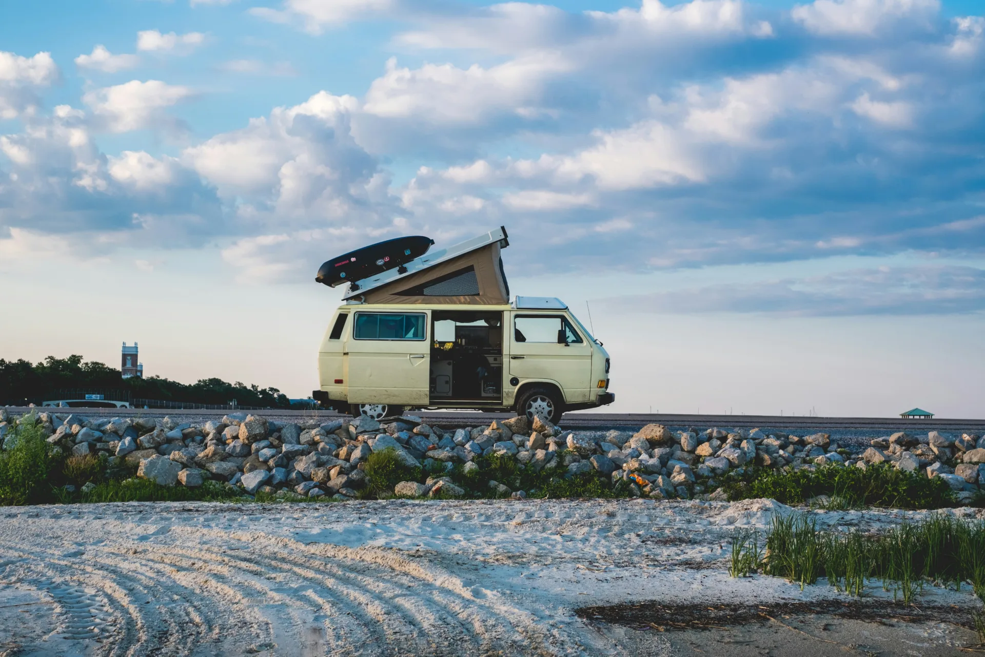 white van under cloudy sky during daytime caravan accessories